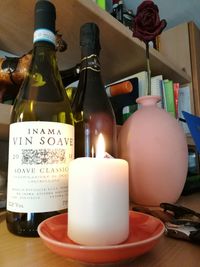 Close-up of wine bottles on table