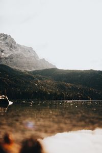 Scenic view of lake against clear sky