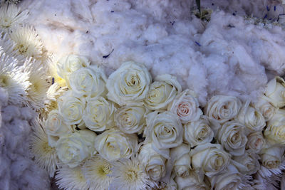 Close-up of roses and chrysanthemum flowers