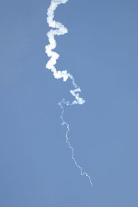 Low angle view of vapor trail in sky