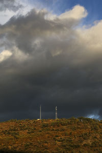 Smoke stacks against sky