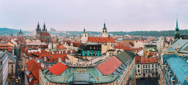 High angle view of buildings in city against sky