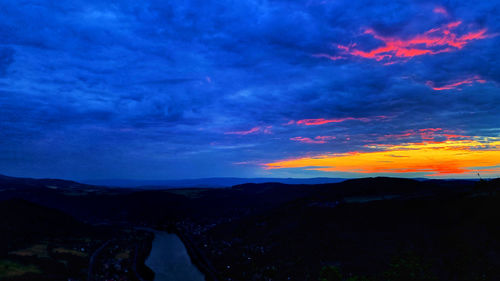 Scenic view of dramatic sky during sunset