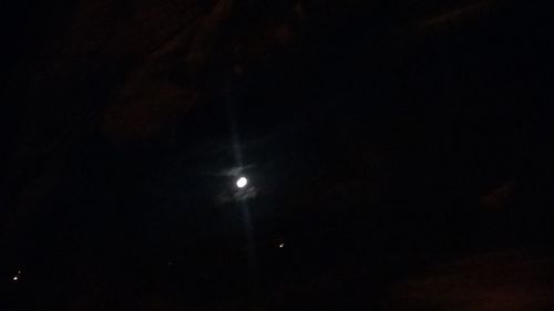 Close-up of illuminated moon at night