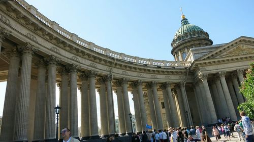 Tourists in front of building