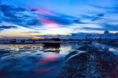 Scenic view of sea against sky at sunset