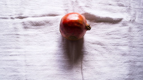 Close-up of red object on table