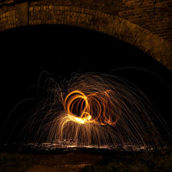 Firework display at night