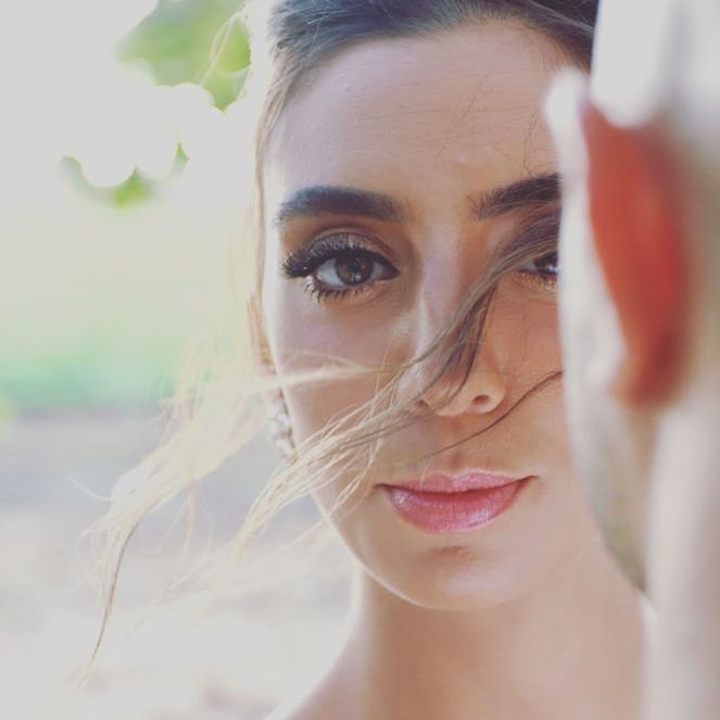 CLOSE-UP PORTRAIT OF YOUNG WOMAN WITH EYES