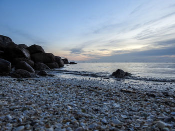 Scenic view of sea against sky during sunset