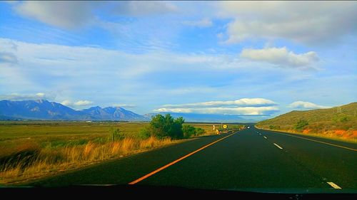 Country road passing through landscape