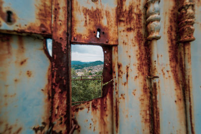 Close-up of rusty metal window