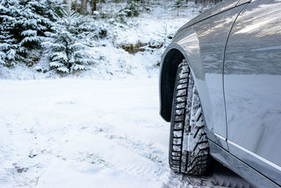 Close-up of tire tracks in snow