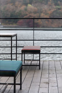 Empty chairs and tables in park