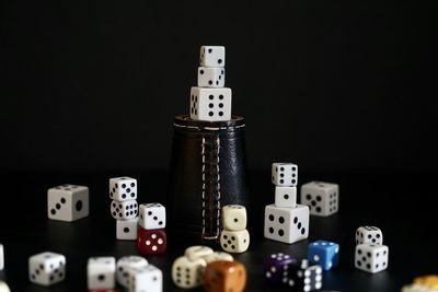 Close-up of objects on table against black background