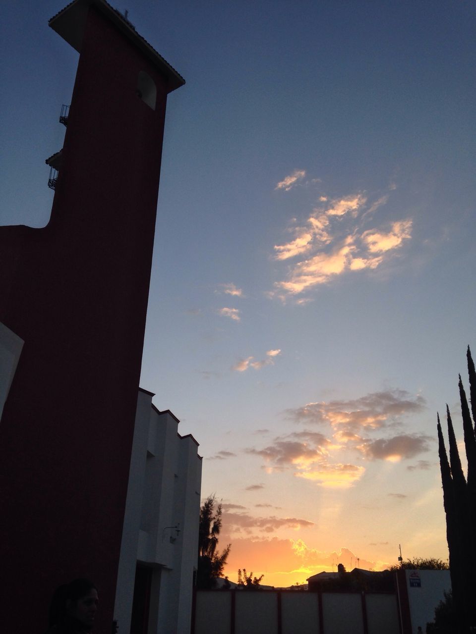 LOW ANGLE VIEW OF SILHOUETTE BUILDING AGAINST SKY DURING SUNSET