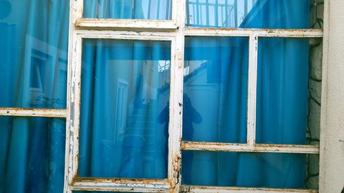 Full frame shot of blue window of building