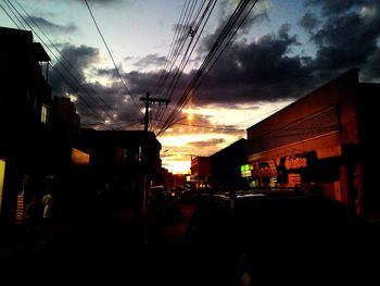 View of city street at sunset