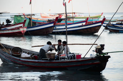 Boats moored in sea