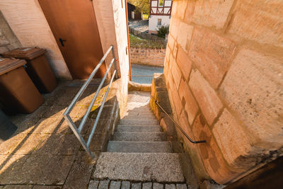 High angle view of staircase amidst buildings