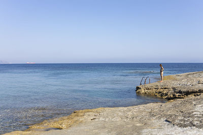 Scenic view of sea against clear sky