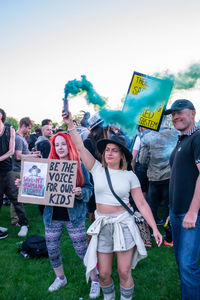 Group of people standing against the wall