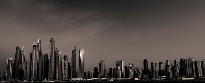 Panoramic view of modern buildings against sky