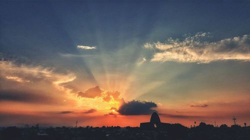 Scenic view of dramatic sky during sunset