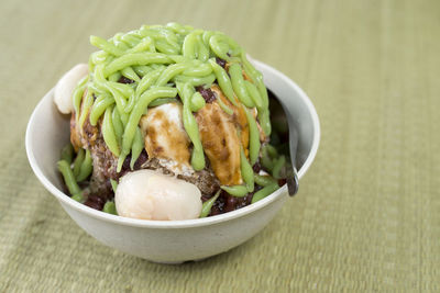 Close-up of salad in bowl on table