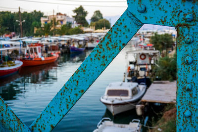 View of boats moored along canal