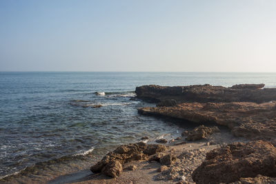 Scenic view of sea against clear sky