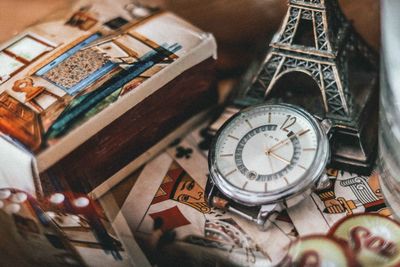 High angle view of clock on table