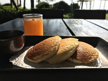 Close-up of breakfast served on table