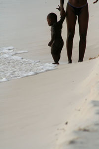 People walking on beach