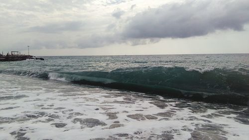 Scenic view of beach against sky