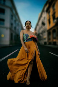 Woman in a beautiful dress walking majestically 