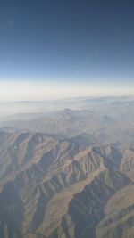 Aerial view of dramatic landscape against sky