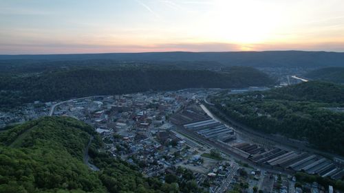 High angle view of townscape against sky at sunset