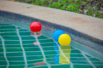 High angle view of multi colored ball in swimming pool