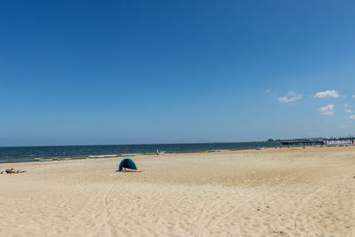 Scenic view of beach against sky