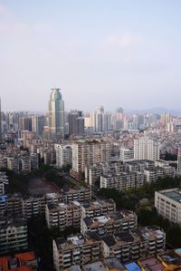 High angle view of buildings in city against sky