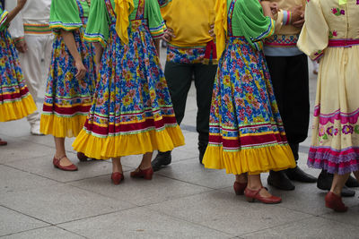 Low section of people standing in temple