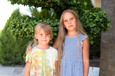 Happy sibling kids travelers boy brother of five years old and girl sister of eight years