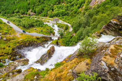 Waterfall in briksdal glacier. panoramic view to kleivafossen waterfall on briksdalselva river.