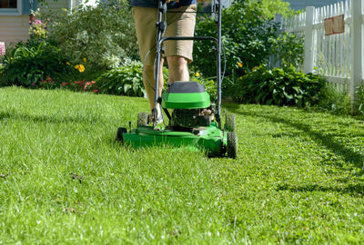 Low section of man working in yard