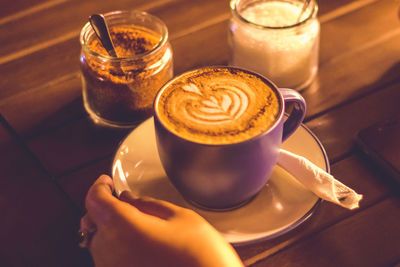 High angle view of coffee cup on table