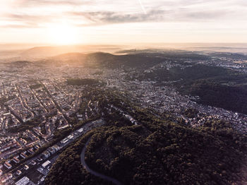 Aerial view of cityscape during sunset