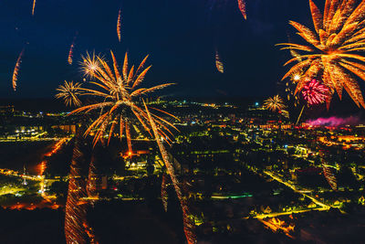 Firework display at night