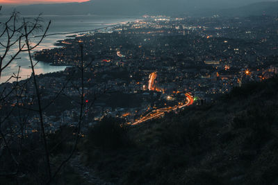 High angle view of illuminated cityscape at night