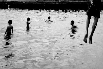 Reflection of people in water